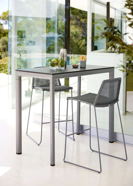 Drop Barbord, 150x75 cm från Cane-line - Lava grey / Fossil black, ceramic - Jacobsen Plus