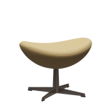 3127 Fotpall till Ägget, stativ i brun brons av Arne Jacobsen - Haze læder - Beige - Jacobsen Plus
