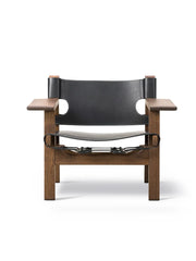 The Spanish Chair i svart läder, rökoljad ek av Børge Mogensen