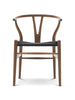 Y-stol CH24, Ek rökoljad med svart flätning av Hans J. Wegner